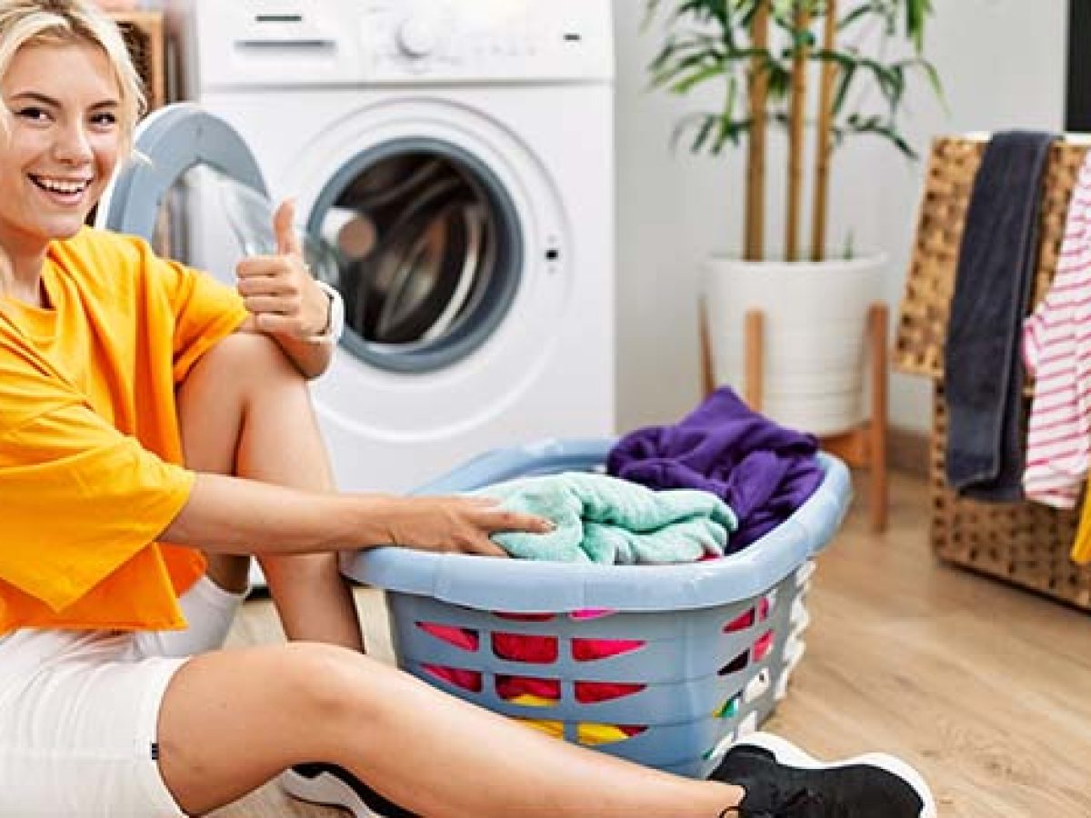 https://kellysdrycleaners.com/wp-content/uploads/KDC-Young-caucasian-woman-putting-dirty-laundry-1200x900.jpg
